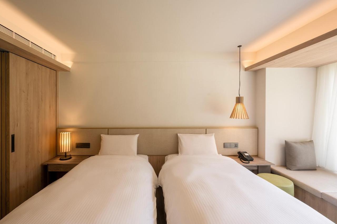 Howard Resort Xitou لوغو المظهر الخارجي الصورة