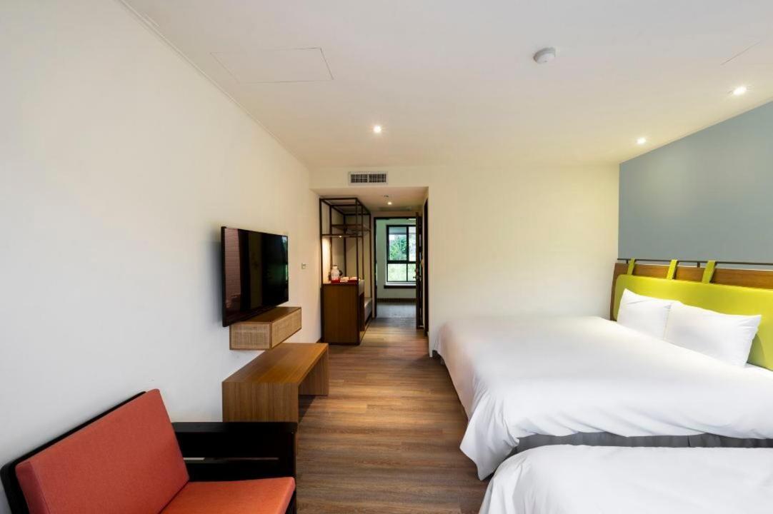 Howard Resort Xitou لوغو المظهر الخارجي الصورة
