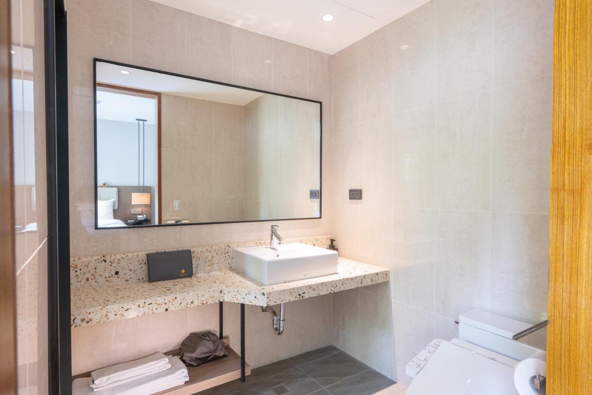 Howard Resort Xitou لوغو المظهر الخارجي الصورة
