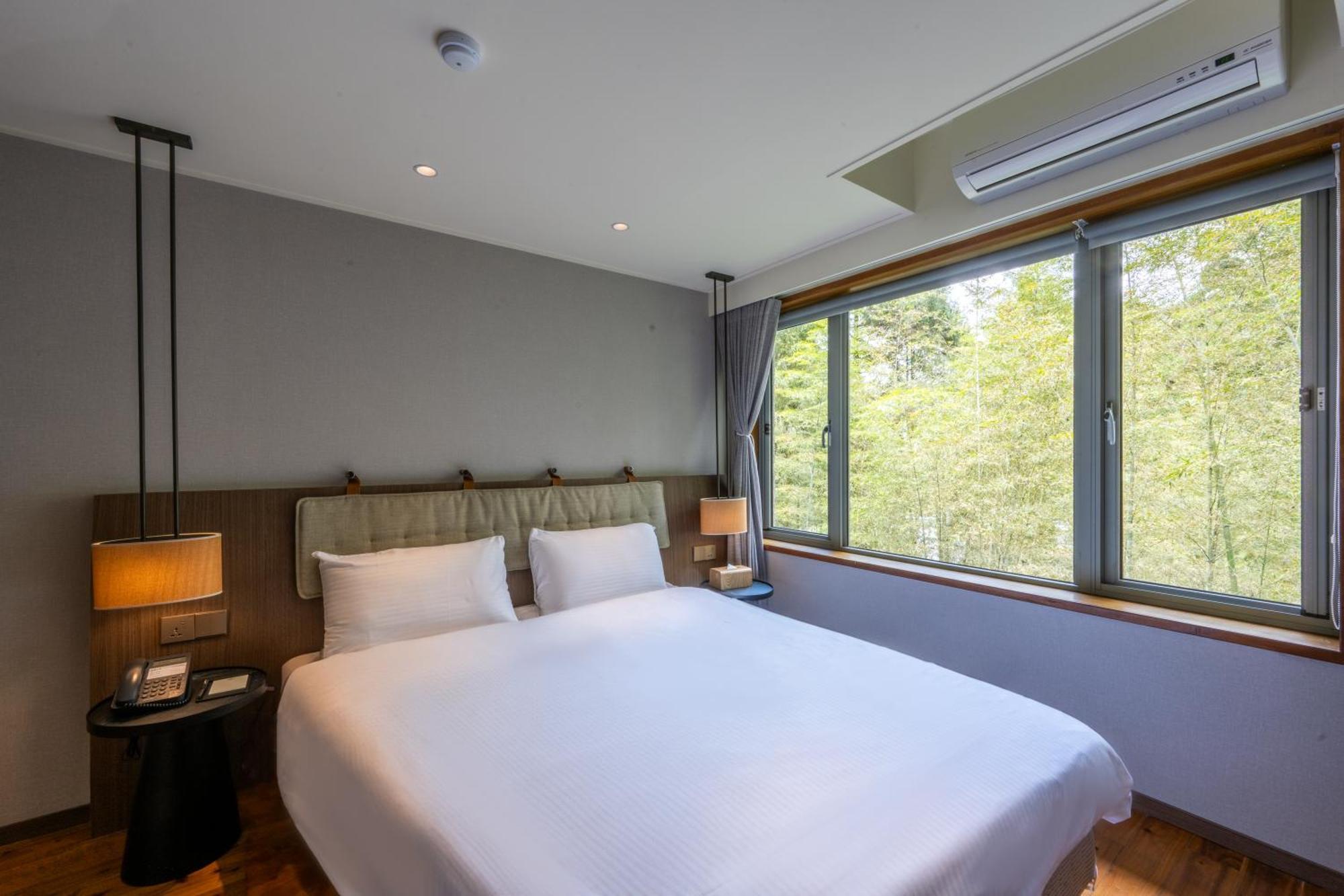 Howard Resort Xitou لوغو المظهر الخارجي الصورة