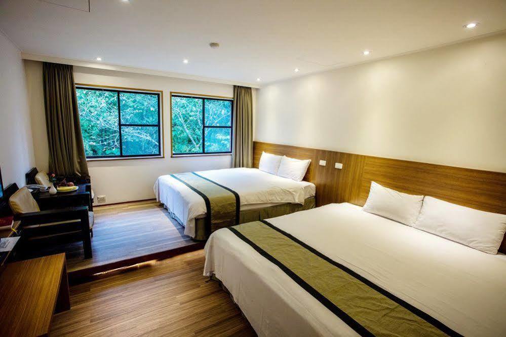 Howard Resort Xitou لوغو المظهر الخارجي الصورة